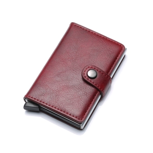 Detail of burgundy PU leather pop-up card holder with metal wallet mechanism and snap button