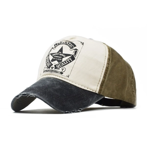 Detail of vintage distressed baseball cap featuring star print and tri-color patchwork