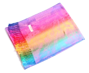 Detail of colorful peacock feather pattern on pashmina scarf with elegant fringe trim