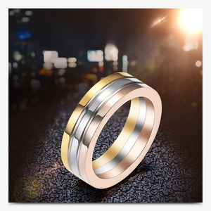 Three-tone brushed stainless steel ring in gold, silver and rose gold finishes