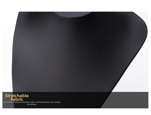 Macro view of black matte fabric display stand showing stretchable texture and fine grain