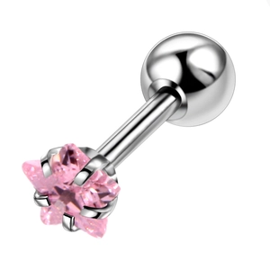 Macro side view of a pink star-shaped zircon stud earring with polished stainless steel base