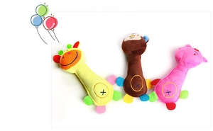 Close-up of soft plush animal rattles for baby sensory play and teething