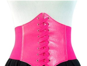 Pink lace-up corset belt with elastic band and metal eyelets on a mannequin