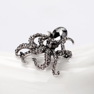 Exquisite ocean series octopus brooch with grey crystals and rhinestones on a wave base