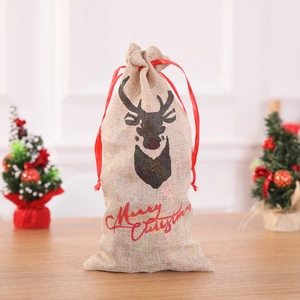 Christmas burlap wine bottle gift bag with reindeer print and red drawstring closure