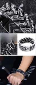 Detailed macro view of retro skull engraved stainless steel V-links punk bracelet