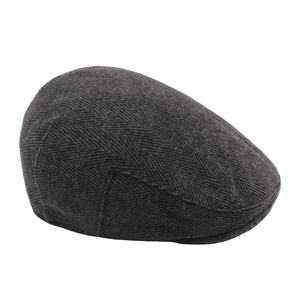 Dark grey herringbone newsboy cap for men in warm wool fabric with a classic flat brim