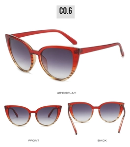 Three angles of red and tortoise shell cat-eye sunglasses with gradient purple lenses