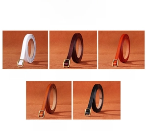 Detail of slim genuine leather belts for women in five colors with golden buckles