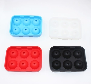 Set of four 6-cavity silicone ice ball molds in blue, clear, red, and black colors