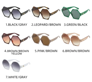 Detailed view of hexagonal PC sunglasses in seven diverse colors with round metal logos