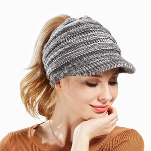 Detail view of the gray knit ponytail baseball cap with textured wool blend fabric