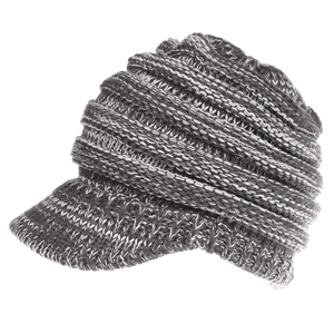 Detail of dark grey knit baseball cap with ribbed texture and short curved brim design