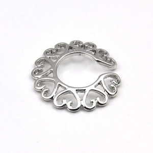 Silver hollow heart-shaped non-pierced nipple ring shield with a polished finish