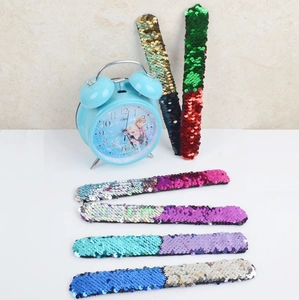 Set of colorful reversible sequin slap bracelets for children in various shiny dual tones