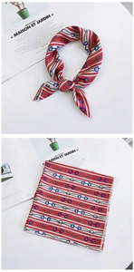 Detail of silk square scarf with nautical rope patterns in red, white and blue colors