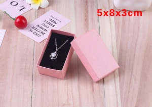 Pink Laini texture jewelry box with black sponge insert showing 5x8x3cm dimensions