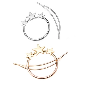 Close-up of geometric star and moon hair clip set in silver and rose gold finish