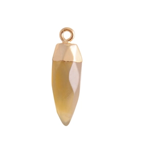 Macro view of faceted long amber resin pendant with golden metal cap for jewelry DIY