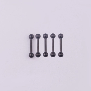 Five pieces of black 316L stainless steel tongue rings with spherical ends on white backdrop
