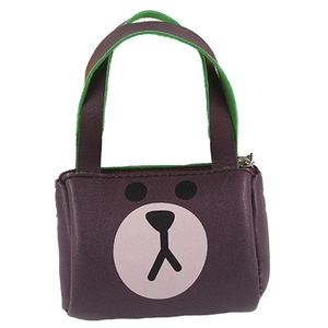 Miniature brown faux leather handbag accessory with green straps for 18 inch dolls