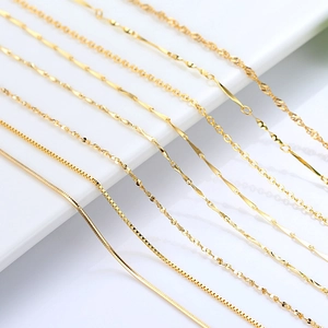 Collection of 14K gold plated necklaces including snake and water wave chain styles
