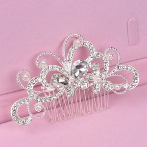 Silver bridal hair comb with pearls and rhinestones presented in a pink velvet jewelry box