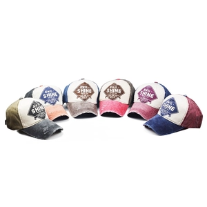 Multiple vintage distressed cotton baseball caps with embroidered motor oil patches