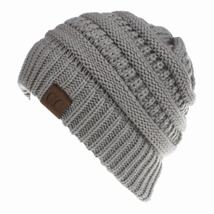 Winter cable knit beanie in light grey with ponytail hole and brown leather C.C patch