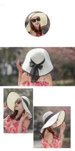 Dettaglio di un cappello di paglia bianco a tesa larga con fiocco nero ideale per la spiaggia
