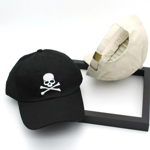 Classic cotton baseball cap with skull embroidery in black and beige, unisex casual style