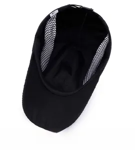Internal detail of black mesh sport cap showing breathable fabric and sewing craftsmanship