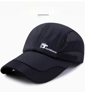 Detail of black quick-dry outdoor sport hat showing breathable mesh side and logo