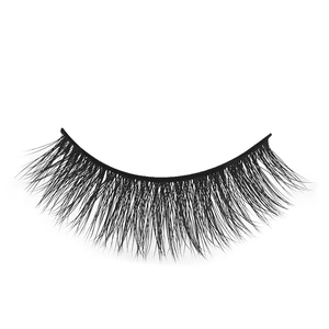 Detailed close-up of thick 3D false eyelashes with natural curl on white background