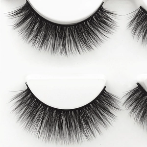 Dramatic 3D thick false eyelashes for volume and length on a clean white background