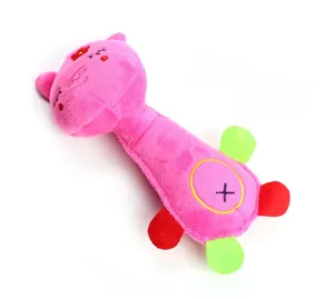 Detail of pink pig squeaky dog toy with durable plush fabric and embroidery textures