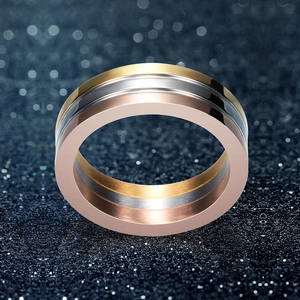 Three-tone minimalist stainless steel ring in gold, silver and rose gold finishes