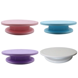 Rotating cake turntable stand set available in pink, blue, purple, and white plastic
