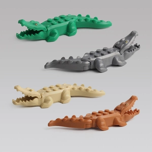 Colorful plastic crocodile building block toys in green, grey, beige, and brown colors