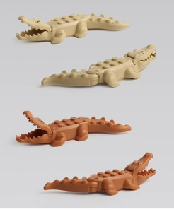 Detailed view of four interlocking plastic crocodile building block figures in beige and brown