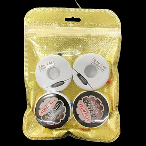 Detail of fishing line set in a gold aluminum foil zip lock bag with rounded corners