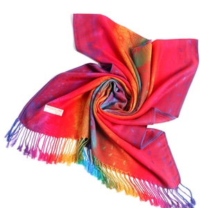 Detailed view of colorful feather pattern pashmina scarf with elegant fringe trim