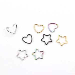 316L stainless steel heart and star shaped piercing rings in diverse metallic colors