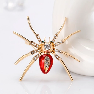 Exquisite gold spider brooch with vibrant red abdomen and sparkling crystal inlays