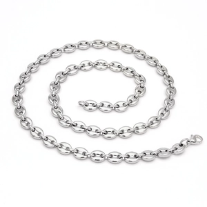Macro shot of silver stainless steel coffee bean chain with polished oval link detail