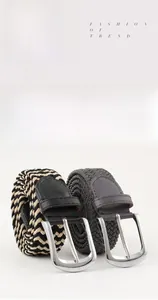 Detail of elastic woven stretch belts with alloy pin buckles in navy blue and grey