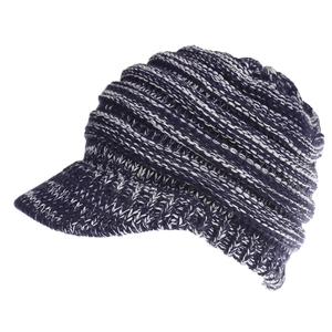 Detail of navy blue knit ponytail baseball cap featuring thick ribbed texture and reinforced brim