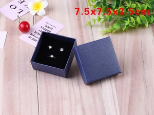 Detail view of 7.5x7.5x3.5cm lake blue jewelry box with black velvet insert for rings