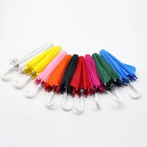 Set of 9 colorful mini long-handle umbrellas for 18-inch dolls on a white background